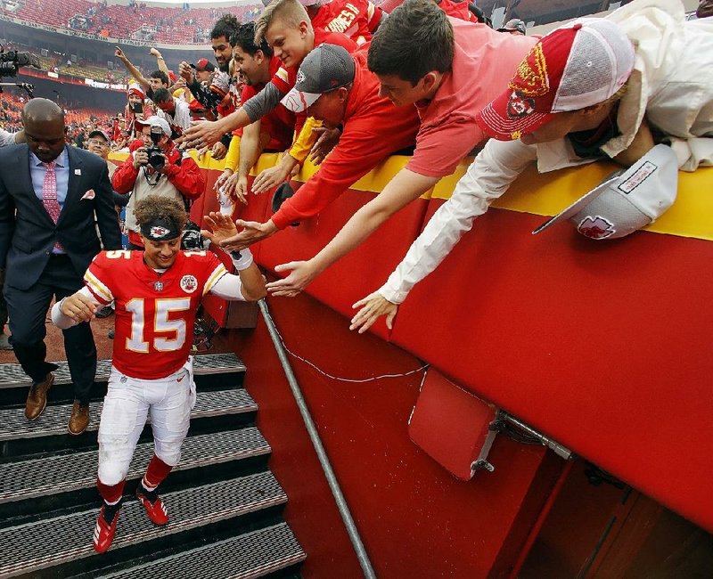 Kansas City quarterback Patrick Mahomes greets fans on his way to the locker room after last week’s victory over the Jacksonville Jaguars. After leading the Chiefs to a 5-0 start as they face the New England Patriots tonight, Mahomes has become one of the most exciting players in the NFL. 