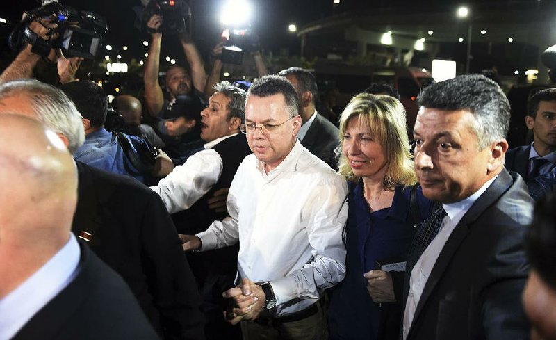 American pastor Andrew Brunson and his wife, Norine, arrive at the airport in Izmir, Turkey, on Friday after Brunson was freed by a Turkish court, ending his 24-month imprisonment in the aftermath of a failed coup in 2016. 