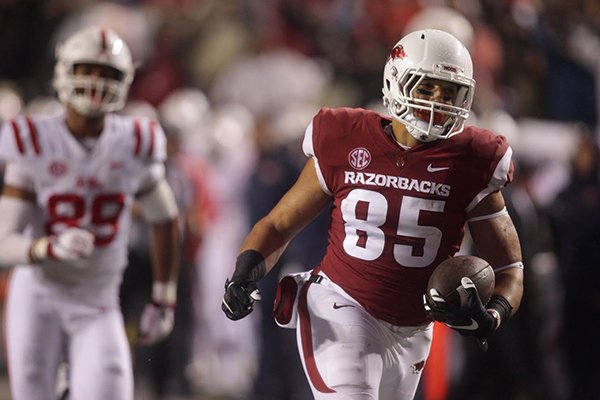 Arkansas tight end C.J. O'Grady runs after the catch during a game against Ole Miss on Saturday, Oct. 13, 2018, in Little Rock. O'Grady scored a 39-yard touchdown on the play. 