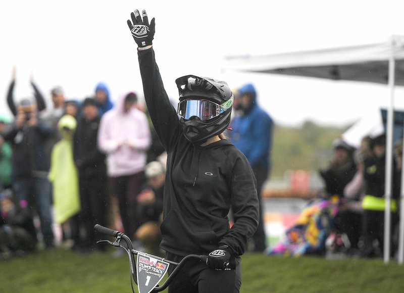 NWA Democrat-Gazette/CHARLIE KAIJO Women's champion Christa Von Niederhausern celebrates during the Red Bull Pump Track Championships Saturday at The Jones Center in Springdale.