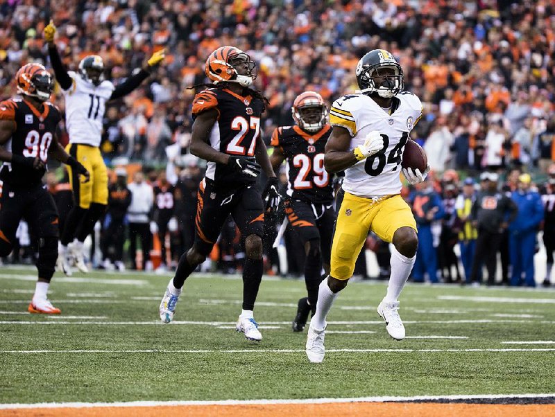 Pittsburgh wide receiver Antonio Brown (84) caught a 31-yard touchdown pass with 10 seconds left to lift the Steelers to a 28-21 victory over the Cincinnati Bengals on Sunday.