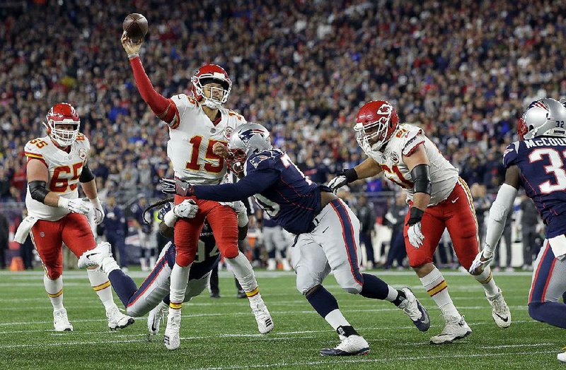 Patrick Mahomes (15) and the Kansas City Chiefs do not feel discouraged after losing 43-40 to the New England Patriots on Sunday night. The Chiefs overcame a 24-9 halftime deficit to tie the game at 40-40 before losing on a last-second field goal.