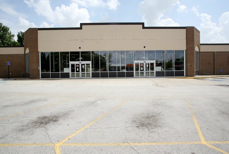 File photo/NWA Democrat-Gazette/DAVID GOTTSCHALK The former IGA building at 380 N. College Ave. is seen July 2. Ozark Natural Foods, currently housed in the Evelyn Hills Shopping Center, plans to move to the space.