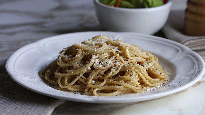 Cacio e pepe is a simple, yet glorious pasta traditionally made with the titular cheese and pepper, plus noodles.