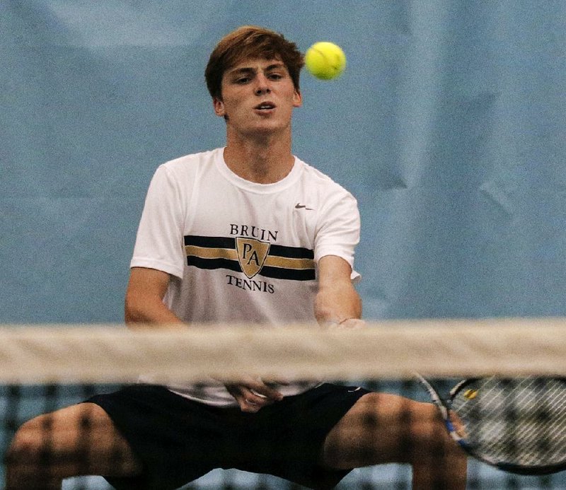 Pulaski Academy junior Foster Rogers hits a shot Tuesday during the boys tennis Overall singles championship at Burns Park Tennis Complex in North Little Rock. Rogers repeated as the singles champion with a 6-1, 6-2 victory over Christian Greer of Joe T. Robinson. 