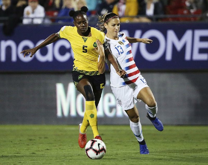 Alex Morgan (13) and the United States will meet Canada in the championship game of the CONCACAF Women’s World Cup qualifying tournament. Morgan scored a goal in the United States’ 6-0 victory over Jamaica on Sunday.