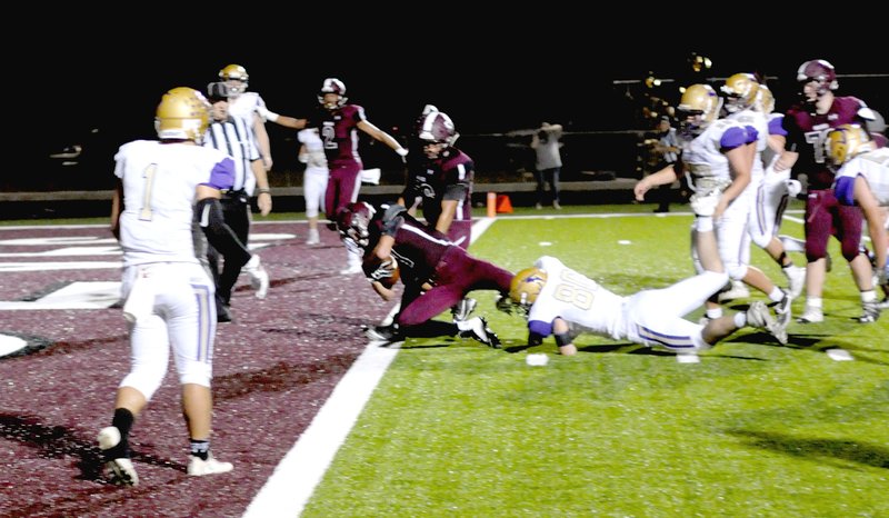 MARK HUMPHREY ENTERPRISE-LEADER Lincoln senior Christian Crittenden scores on a 6-yard run during the Wolves' Homecoming football game versus Berryville on Oct. 5, 2018, at Wolfpack Stadium. The Wolves' senior high football team blanked Green Forest, 50-0, Friday, Oct. 12, 2018. Lincoln is now 6-1 overall and in the thick of the 4A-1 Conference race.