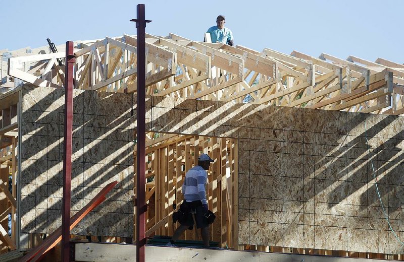 Home construction like this in late August in Denver fell last month, led by declines in the South and Midwest, according to government reports. 
