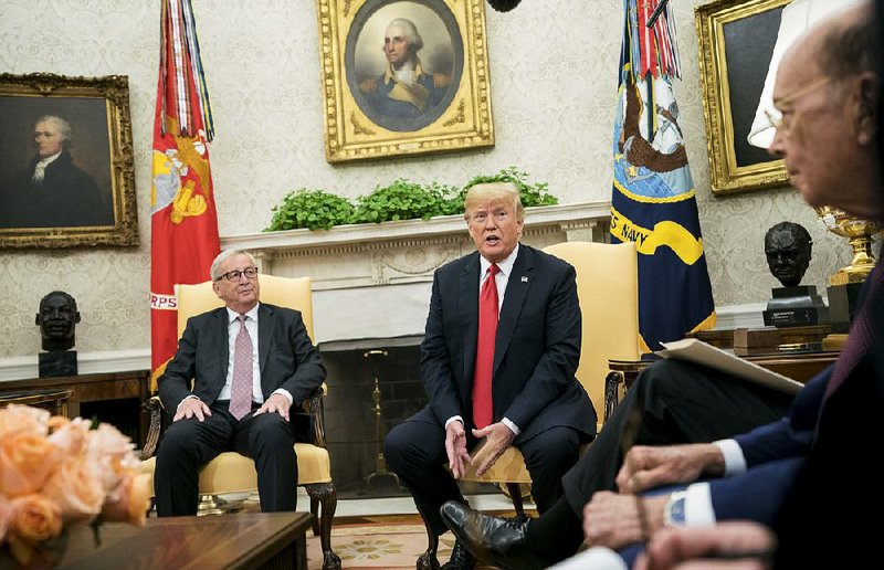 President Donald Trump announces in a July meeting with European Commission President Jean-Claude Juncker (left) an agreement to start talks on eliminating EU and U.S. trade tariffs. 