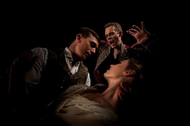 Toby Lewellen (left), Paul Tillman and Meredith Loy sink their teeth into acting as well as dancing in Dracula.

