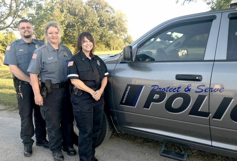 Photo by Sally Carroll/McDonald County Press Goodman Police Chief Curt Drake (left) and part-time reserve officers Michelle Wilson and Lorie Howard serve Goodman neighbors. Not pictured is Officer Joe David.