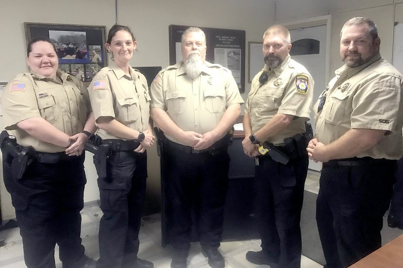 Sally Carroll/McDonald County Press The Noel Marshal's Office serves a diverse community of different cultures and heritages. The work is &quot;more than just a job,&quot; said Marshal Paul Gardner. Officers include: Rhonda Wise (left), Cambria Howard, John Winn, Randy Wilson and Marshal Paul Gardner. Not pictured are Jeremy Walker, Keith Spencer, Craig Peek, Ivan Russell and Michael Gallahue.