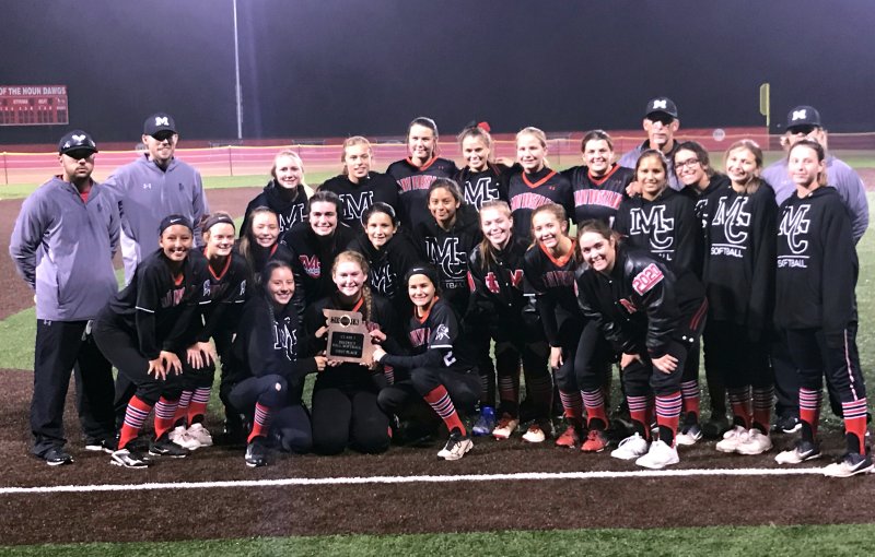 RICK PECK/SPECIAL TO MCDONALD COUNTY PRESS The McDonald County Lady Mustangs won the Missouri Class 3, District 12, Softball Tournament with a thrilling 15-14 win over Monett on Oct. 12 at Aurora High School.