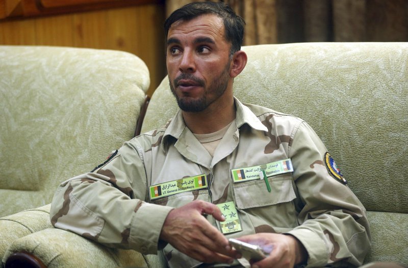 In this Aug. 4, 2016, file photo, Gen. Abdul Raziq, Kandahar police chief, speaks during an interview with The Associated Press in Kandahar, Afghanistan. 