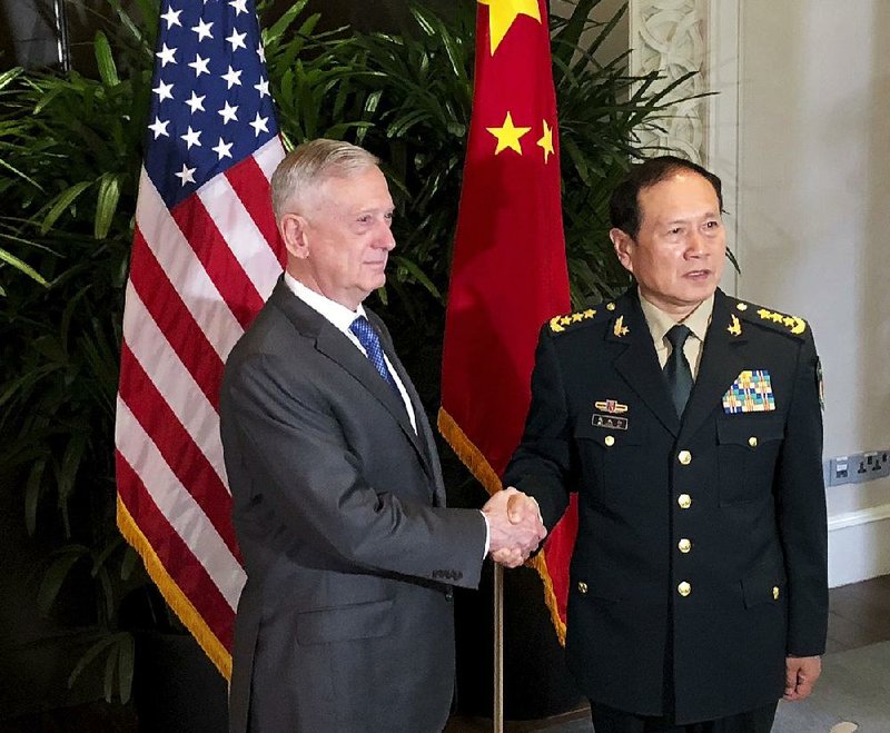 Defense Secretary James Mattis meets Thursday in Singapore with Chinese Defense Minister Wei Fenghe. 