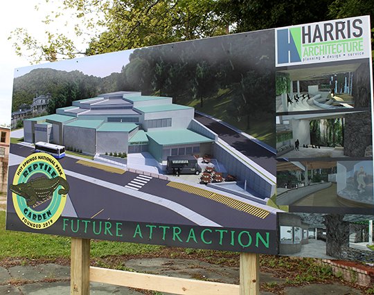 The Sentinel-Record/Richard Rasmussen PROPOSED ATTRACTION: An architect's rendering of Hot Springs National Park Reptile Garden has been erected at the attraction's proposed site on Lodestone Street. This 28,000-square-foot facility will house various reptiles, birds and snakes, according to a news release.