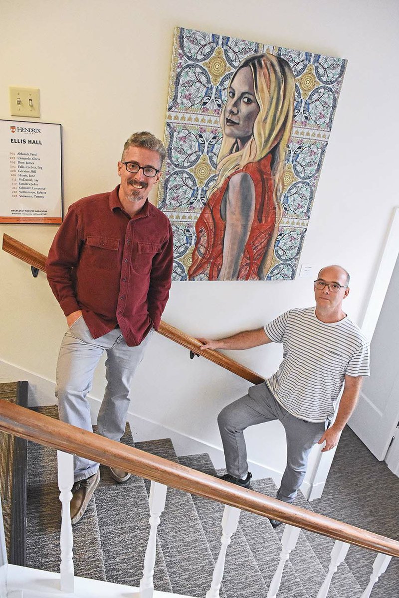 James Dow, left, and Matthew Lopas, associate professors at Hendrix College, jointly curated The Body of Empathy art exhibit on display in Ellis Hall. Among the paintings in the show is this large oil on printed fabric, Emma, by Eva O’Donovan of Dublin, Ireland.