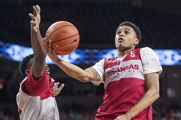 Jalen Harris of red squad shoots in the first half Friday, Oct. 19, 2018, during the Arkansas Red and White scrimmage at Bud Walton Arena in Fayetteville.