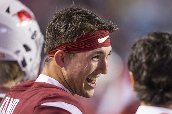 Arkansas quarterback Connor Noland laughs while talking with fellow freshman quarterback John Stephen Jones during a game against Ole Miss on Saturday, Oct. 13, 2018, in Little Rock. 