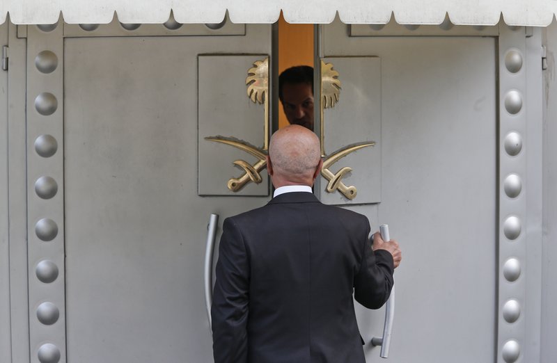 A man enters Saudi Arabia's consulate in Istanbul, Friday, Oct. 19, 2018. A Turkish official said Friday that investigators are looking into the possibility that the remains of missing Saudi journalist Jamal Khashoggi may have been taken to a forest in the outskirts of Istanbul or to another city &#x2014; if and after he was killed inside the consulate earlier this month. (AP Photo/Lefteris Pitarakis)