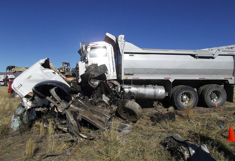 The wreckage from Friday’s crash near Heber, Utah, is shown in this photo provided by the Utah Highway Patrol. 