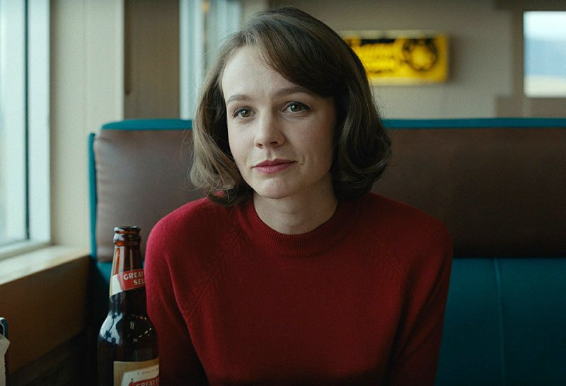 This image released by IFC Films shows Carey Mulligan in a scene from &quot;Wildlife.&quot; (Scott Garfield/IFC Films via AP)