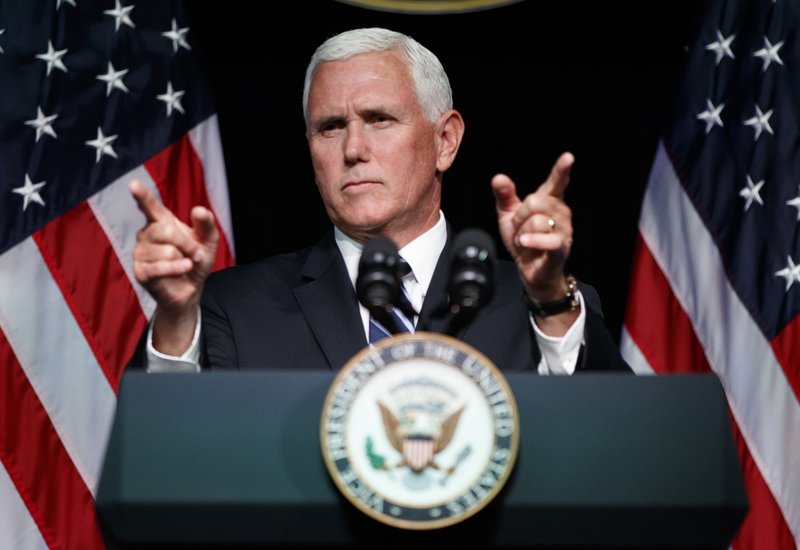 FILE - In this Aug. 9, 2018 file photo, Vice President Mike Pence gestures during an event on the creation of a U. S. Space Force at the Pentagon. With his demand that the Pentagon create a new military service -- a Space Force to assure &#x201c;American dominance in space&#x201d; -- President Donald Trump has injected urgency into a long-meandering debate over the best way to protect U.S. interests in space, both military and commercial. (AP Photo/Evan Vucci)