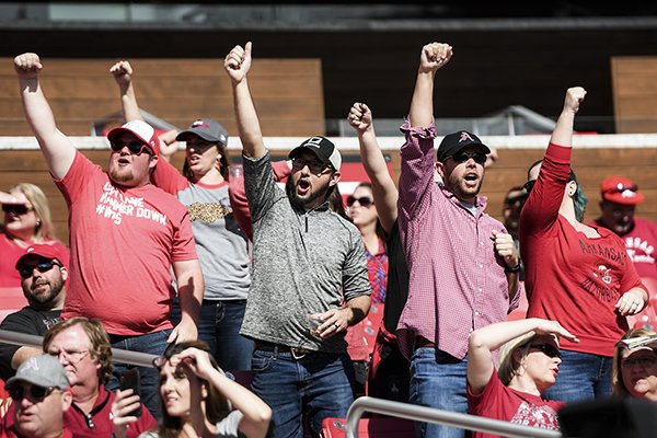 Arkansas Razorbacks fans call the hogs during the fourth quarter of a football game, Saturday, October 20, 2018 at Donald W. Reynolds Razorback Stadium in Fayetteville.