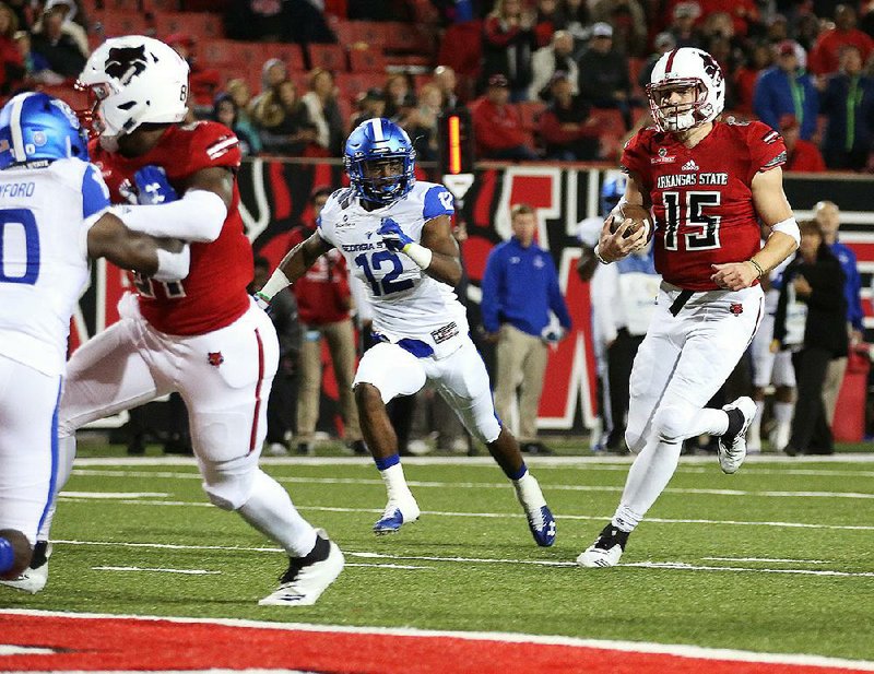 Arkansas State quarterback Justice Hansen runs with the ball in a 51-35 win over Georgia State on Oct. 18.
