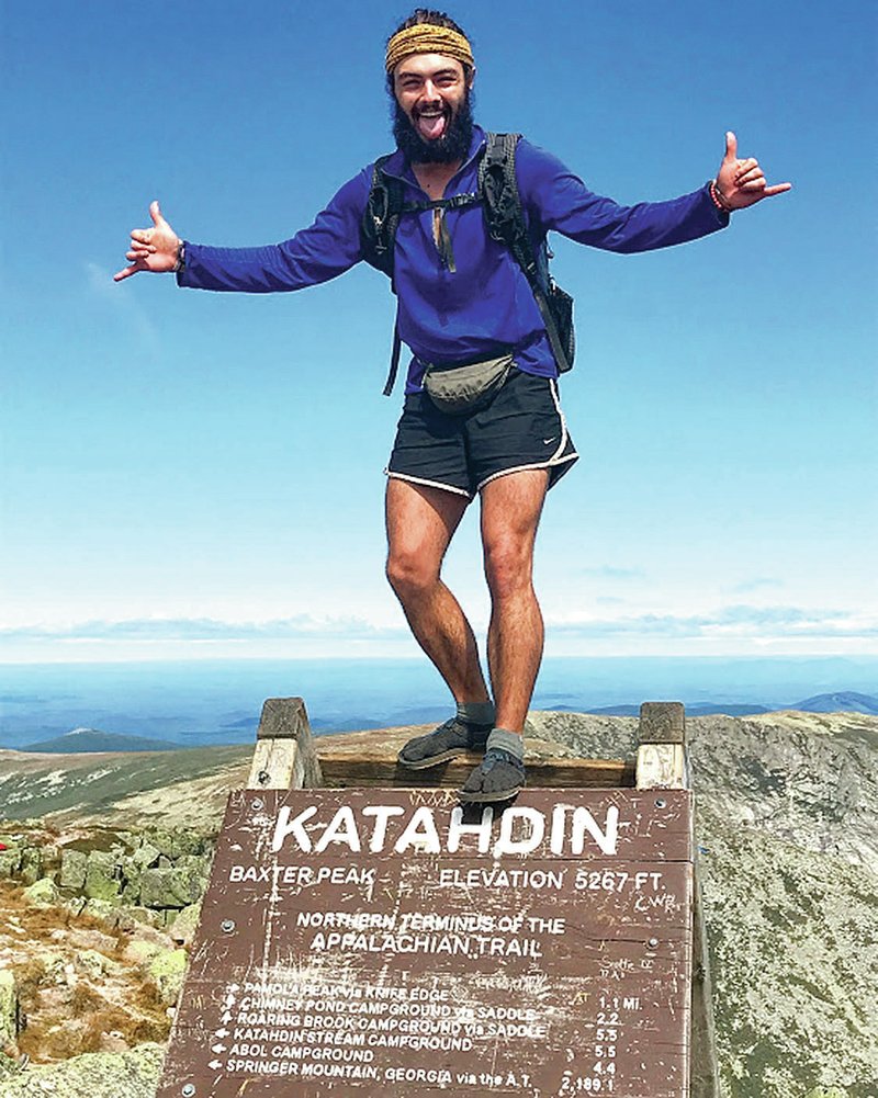 Courtesy photo/MARILYN SLOAS Elliot Schaefer celebrates completing the Appalachian Trail in September at the summit of Mt. Katahdin in Maine. Schaefer, 24, hiked the Pacific Crest Trail in 2017.