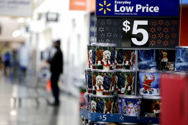 FILE- In this Nov. 9, 2017, file photo items are seen on display ahead of the holiday shopping season at a Walmart store in North Bergen, N.J. (AP Photo/Julio Cortez, File)

