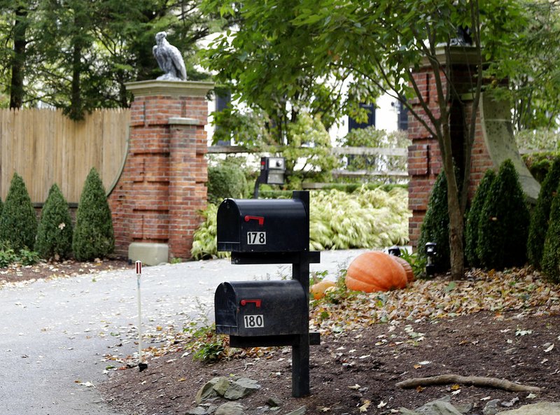 Mailboxes stand outside the entrance to a house owned by philanthropist George Soros in Katonah, N.Y., a suburb of New York City, Tuesday, Oct. 23, 2018. A device found outside the compound "had the components" of a bomb, including explosive powder, a law enforcement official said Tuesday. (AP Photo/Seth Wenig)

