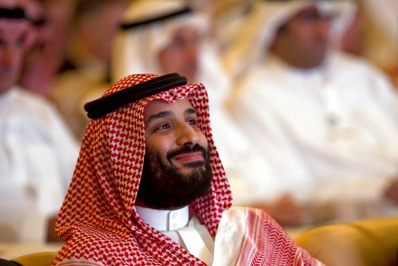 Saudi Crown Prince, Mohammed bin Salman, smiles as he attends the Future Investment Initiative conference, in Riyadh, Saudi Arabia, Tuesday, Oct. 23, 2018. The high-profile economic forum in Saudi Arabia is the kingdom's first major event on the world stage since the killing of writer Jamal Khashoggi at the Saudi Consulate in Istanbul earlier this month. (AP Photo/Amr Nabil)

