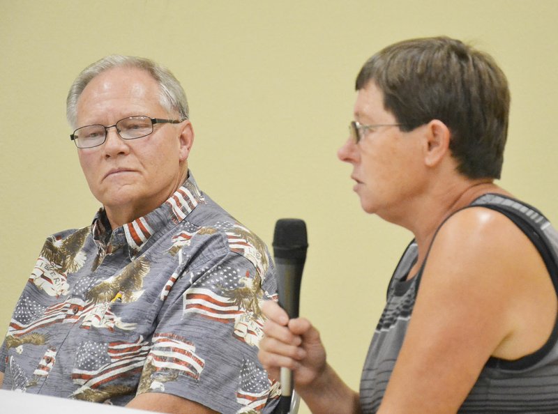 TIMES photograph by Annette Beard City Council member Jim Teeselink and opponent Ellen King answered questions about their vision for city at a forum in the community room at the Northeast Benton County Volunteer Fire Department station 1.