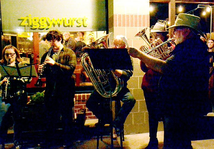 Janelle Jessen/Herald-Leader An Oompa band, led by Keith Rutlege, right, owner of Creekside Taproom, played in front of Ziggywurst during Tap into History.