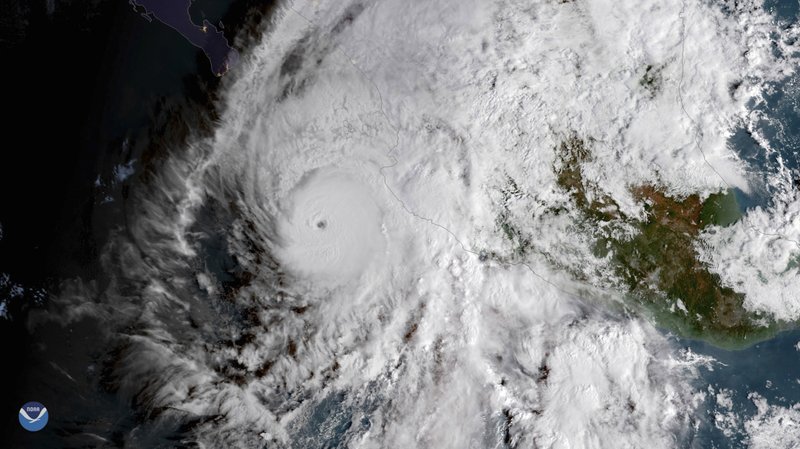 This GOES East satellite image provided by NOAA shows Hurricane Willa in the eastern Pacific, on a path toward Mexico's Pacific coast on Monday, Oct. 22, 2018. (NOAA via AP) story.lead_photo.caption