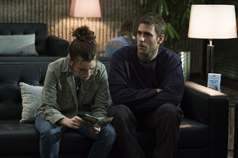 Victoria Pedretti and Oliver Jackson-Cohen star in the Netflix series The Haunting of Hill House. 