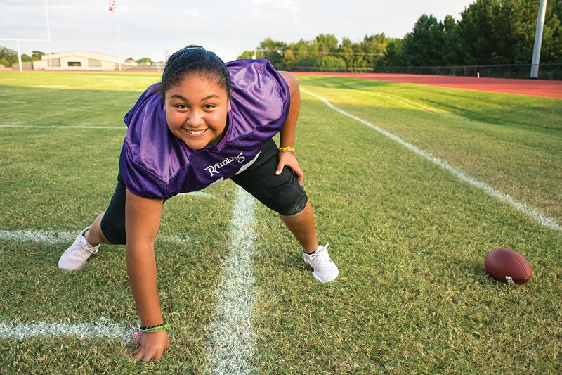 Jayda Tyh-Tyianha Arzola, more commonly known as Tati, is a 12-year-old girl who plays left guard and defensive tackle for the Riverview Youth Athletic Association’s sixth-grade team. Her coach Justin Johnson said “girls look up to her,” and he is confident that she will have a chance to play high school football when she reaches that level.