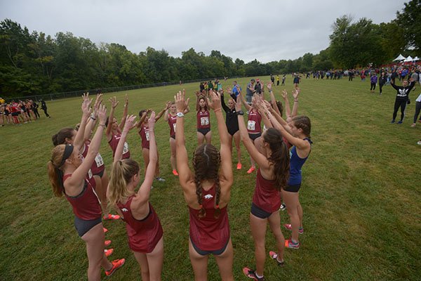 Arkansas runners call the Hogs during the Chile Pepper Festival on Saturday, Sept. 22, 2018, in Fayetteville.