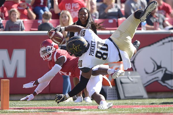 Vanderbilt tight end Jared Pinkney dives into the end zone during a game against Arkansas on Saturday, Oct. 27, 2018, in Fayetteville. 