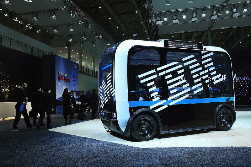 An ‘Olli’ autonomous electric bus with an International Business Machines Corp. logo is displayed at the CeBIT 2017 digital expo in Hanover, Germany. 