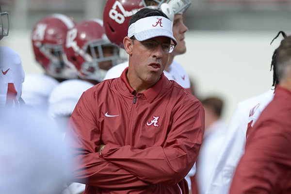 Former Arkansas and current Alabama assistant coach Dan Enos works with his players Saturday, Oct. 6, 2018, at Razorback Stadium in Fayetteville. Visit nwadg.com/photos to see more photographs from the game.