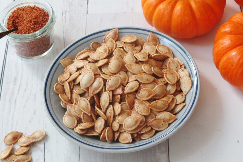 This Sept. 27, 2018 photo shows toasted pumpkin seeds in New York. This dish is from a recipe by Sara Moulton. (Sara Moulton via AP)