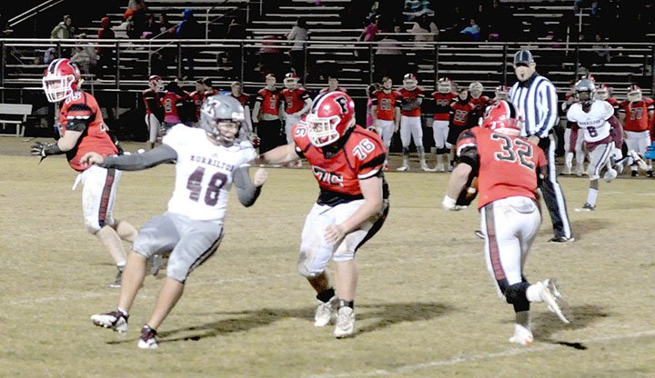 MARK HUMPHREY ENTERPRISE-LEADER Farmington senior Reid Turner cuts beside a block after catching a pass out of the backfield. Turner gained 26 yards on the play, but Farmington lost 52-30 Friday.