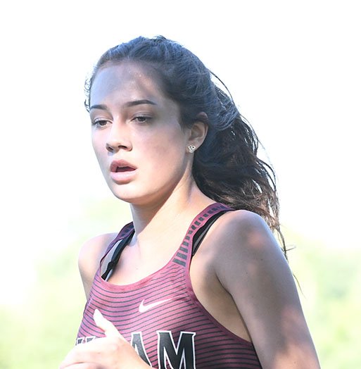 Bud Sullins/Special to the Herald-Leader Siloam Springs senior Chloe McGooden runs in the Panther Cross Country Classic on Sept. 15 at the Simmons Course.