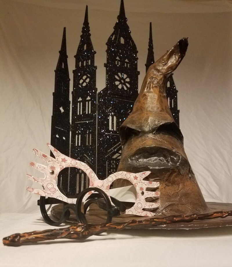 This August 2018 photo provided by Selah Hovda shows a Sorting Hat made by Hovda for her son's Harry Potter-themed birthday party in Phoenix, Ariz. The paper-mache Sorting Hat was made with a base of cereal boxes and cost about $5. (Selah Hovda via AP)