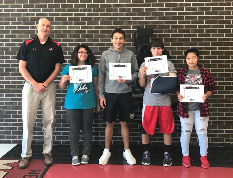 Photo Submitted MCHS Students for the week of Oct. 1-6 are Mr. Wilkie (left), senior Sierra Wilson, junior TaShawn Williams, sophomore Josh Parsons and freshman Moo Say Rae Soe.