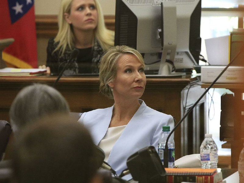 Arkansas Democrat-Gazette/STATON BREIDENTHAL --5/18/18-- Justice Courtney Goodson listens Friday during a hearing in Circuit Judge Chris Piazza's courtroom on her case to get ads she claims are defamatory removed from TV. 