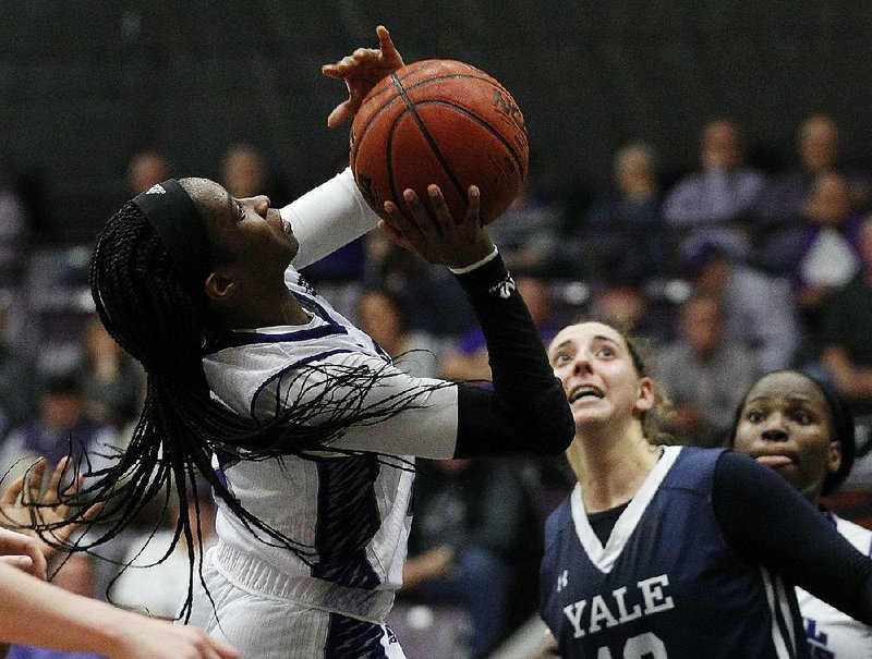 Central Arkansas’ Kamry Orr, shown shooting against Yale in the Women’s Basketball Invitational championship game last season, is one of three returning senior guards for the Sugar Bears.