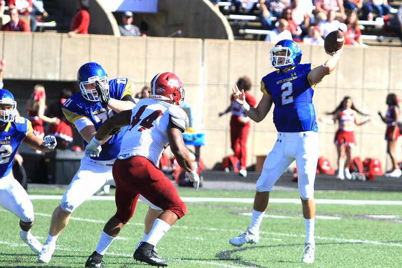 SAU quarterback Barrett Renner gets blocking from lineman Mason Grantz during last week’s action against Henderson State. The 20th-ranked Muleriders (8-1) will play their biggest game of the season Saturday afternoon in Arkadelphia against unbeaten and No. 4-ranked Ouachita Baptist. The winner will be on track for a GAC title and a spot in the NCAA Division II playoffs.